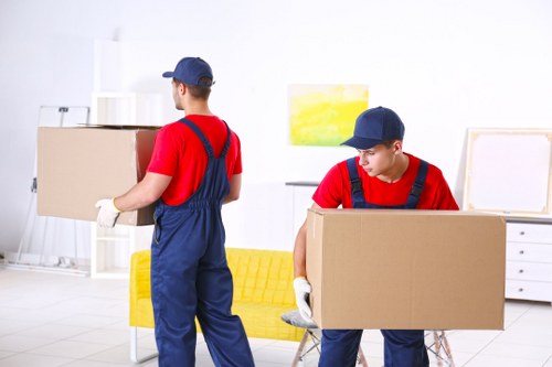 Man with a van service loading furniture in Egham