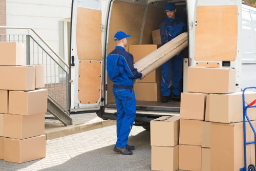 Moving house planning in Egham with packed boxes