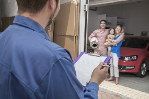 Removal team preparing boxes and furniture safely