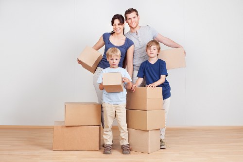 Office relocation planning in Egham with moving boxes and workspace setup