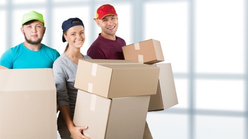 Piano protected during transport in Egham