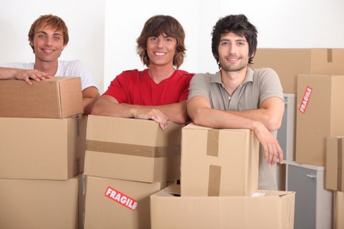 Specialist team preparing a piano move in Egham
