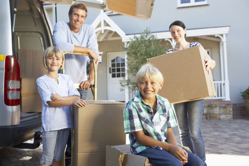 Professional movers using PPE during a relocation