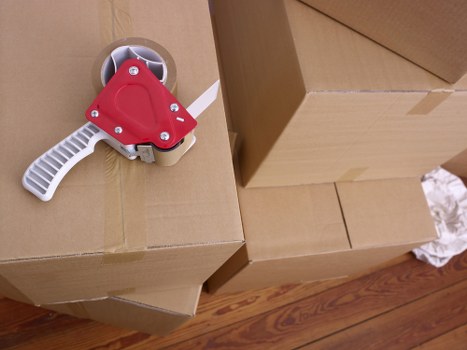 Professional man and van loading items for storage in Egham